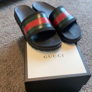 Gucci men’s slides size 10. Gently worn once!